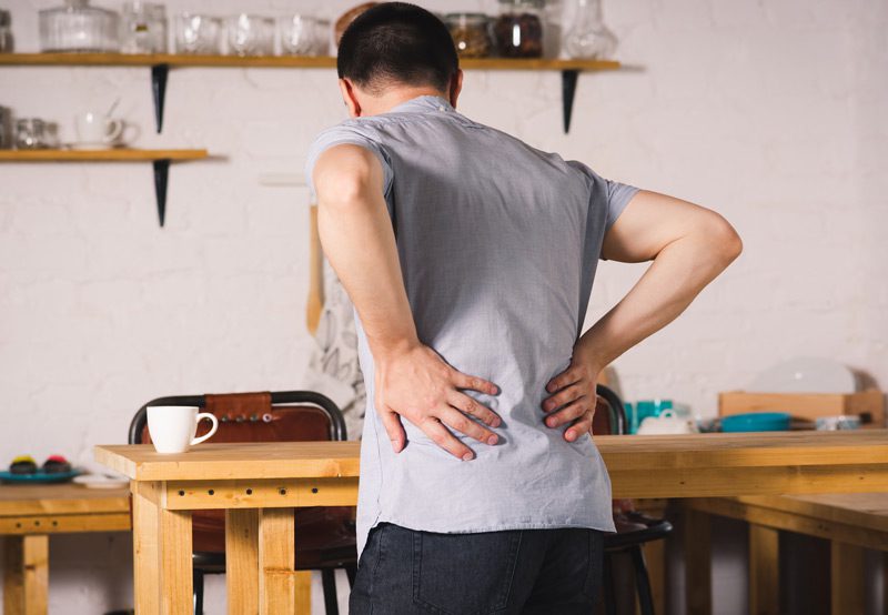 Man-with-back-pain-from-kidney-inflammation